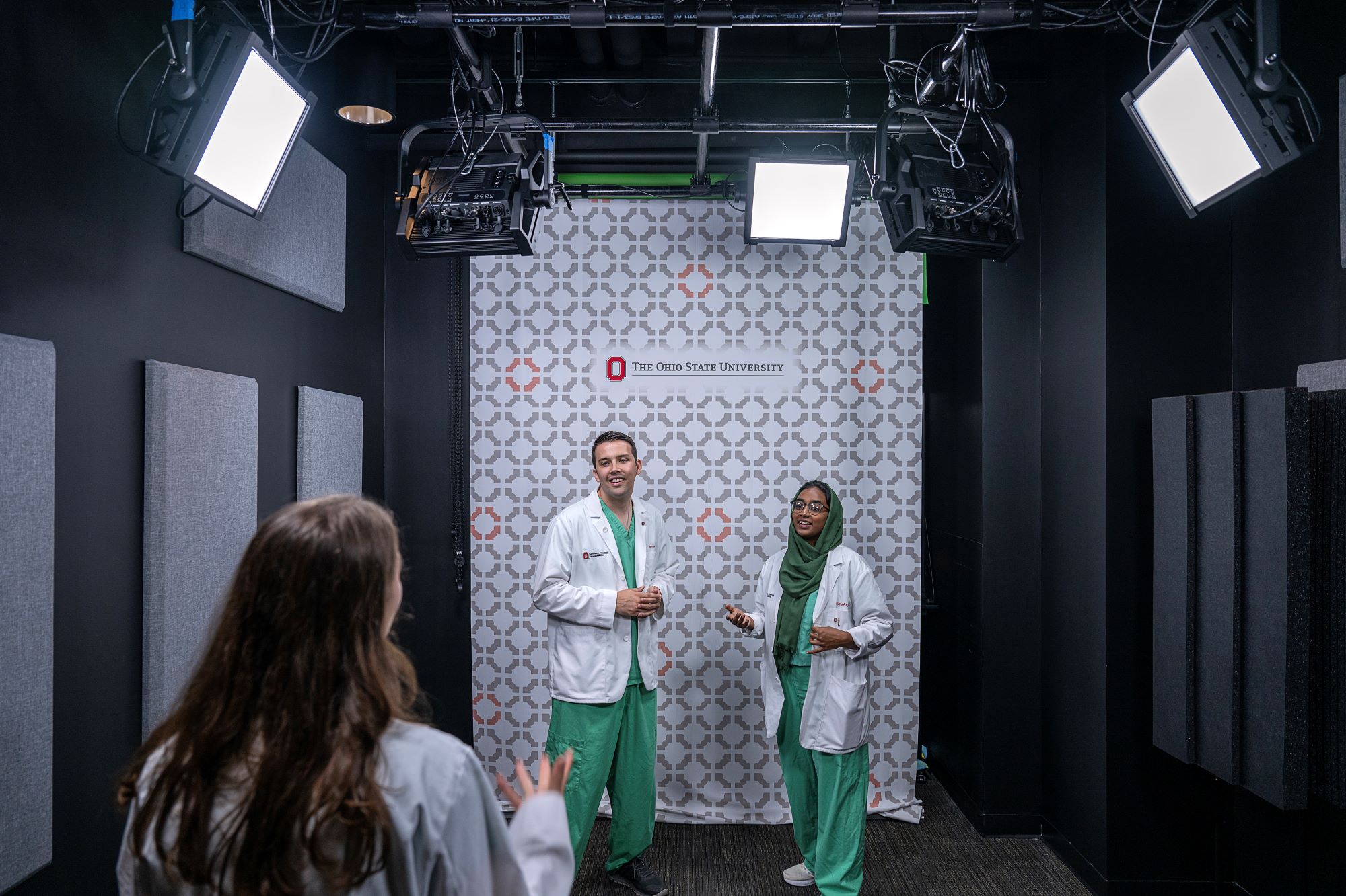 Students in white coats recording in the ETI Studio Zone