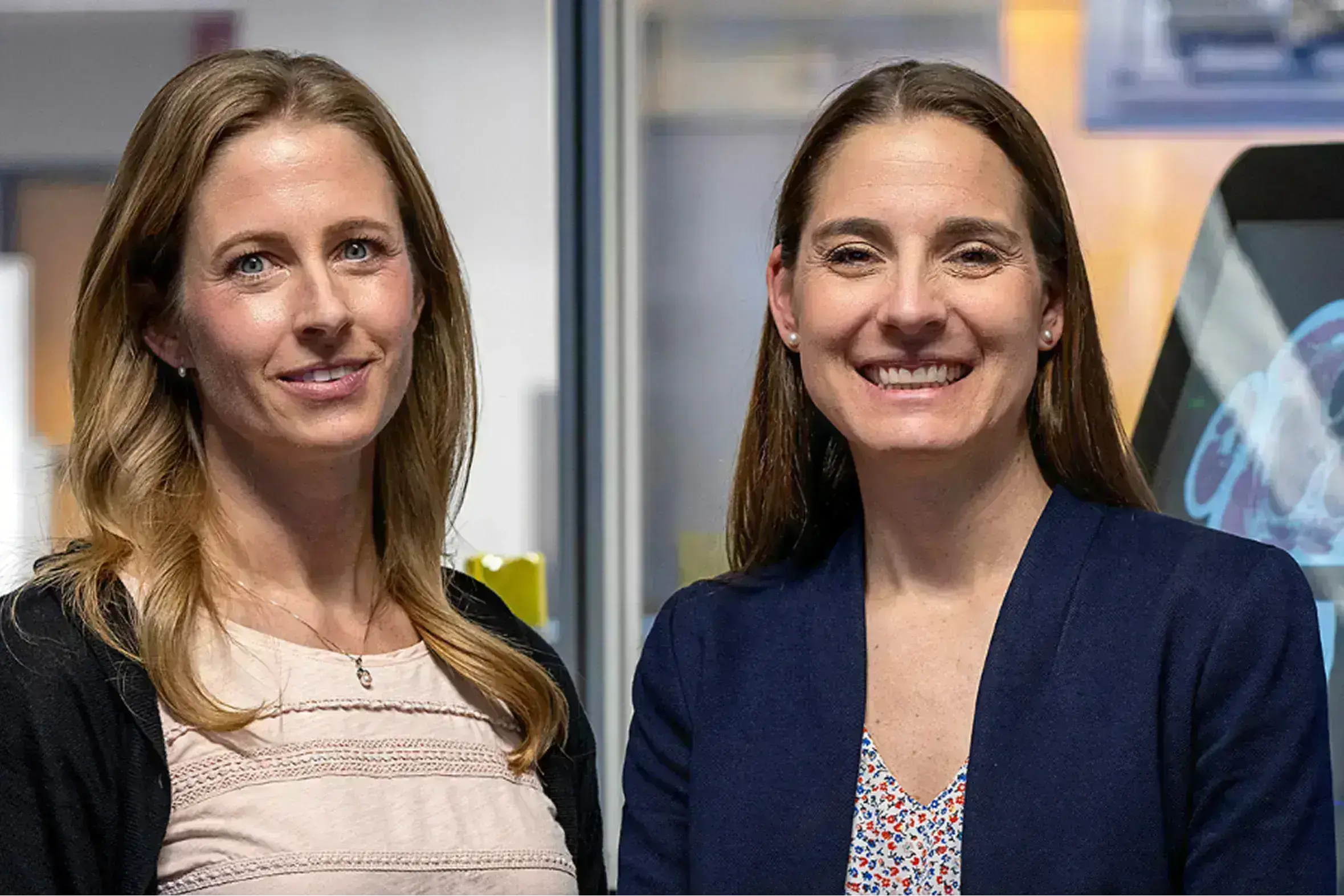 Two women smiling